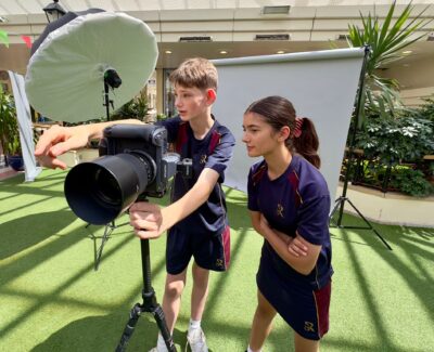 Two Rookwood School students looking into the camera during a photo shoot in Andover town centre