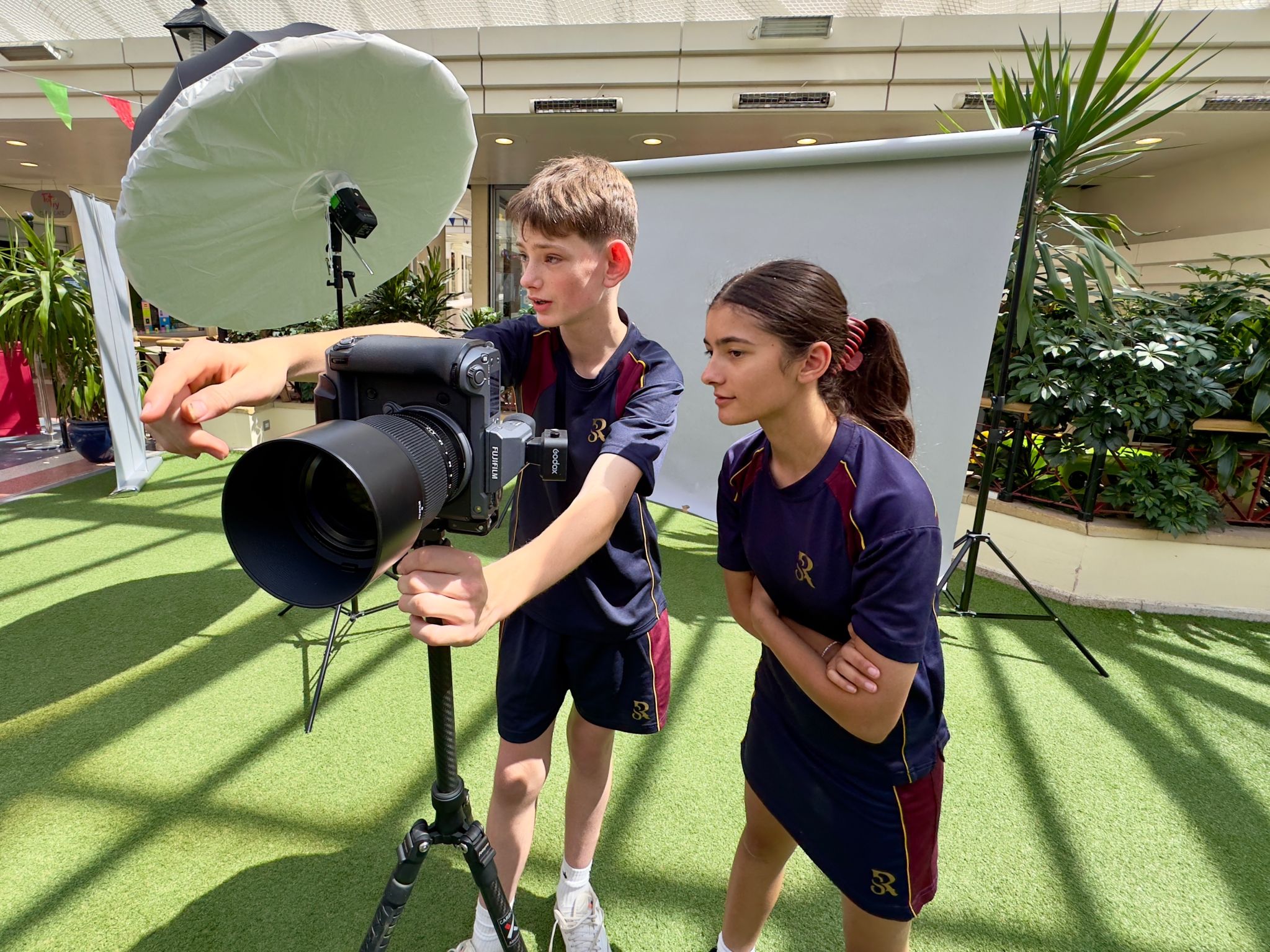 Two Rookwood School students looking into the camera during a photo shoot in Andover town centre