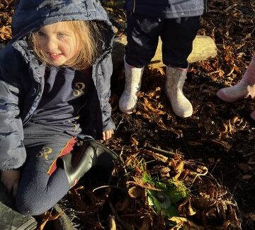 Reception pupils learning outside